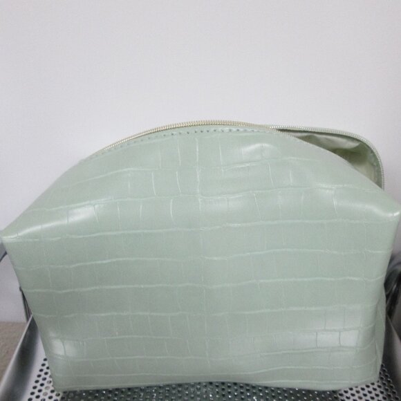 Ulta Handbags - Sea Foam Green Faux Croco Make-up zipper bag from Ulta